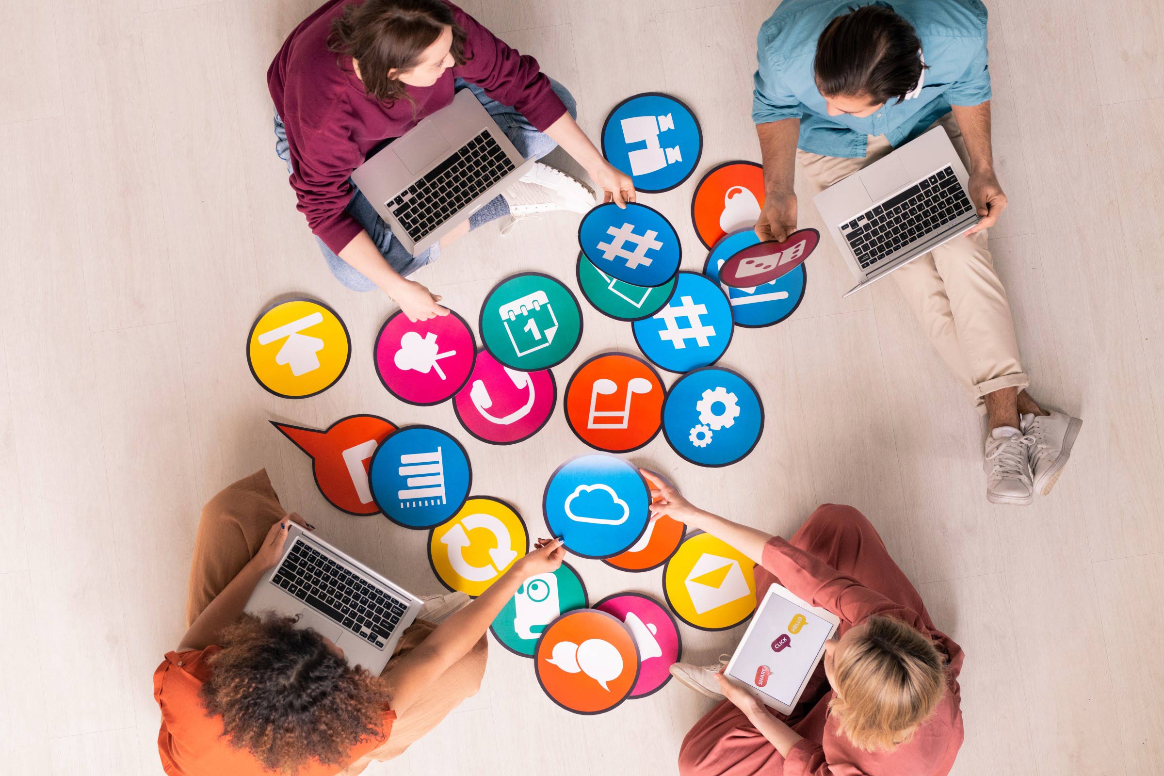 Digital marketing team shown collaborating with digital tools